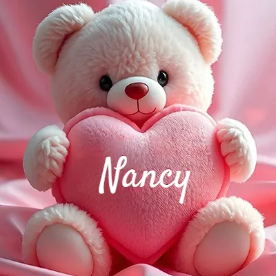Osito de peluche rosa suave y esponjoso, sentado sosteniendo un gran corazón de felpa rosa, nombre grabado. - Nancy