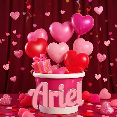 Cubo rosa lleno de globos en forma de corazones rojos y rosas, con pequeños regalos esparcidos sobre un fondo de cortinas de terciopelo rojo que sugieren un ambiente festivo cálido. El nombre Ariel está escrito en el diseño.