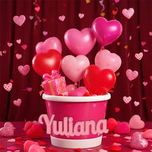 Cubo rosa lleno de globos en forma de corazones rojos y rosas, con pequeños regalos esparcidos sobre un fondo de cortinas de terciopelo rojo que sugieren un ambiente festivo cálido. El nombre Yuliana está escrito en el diseño.
