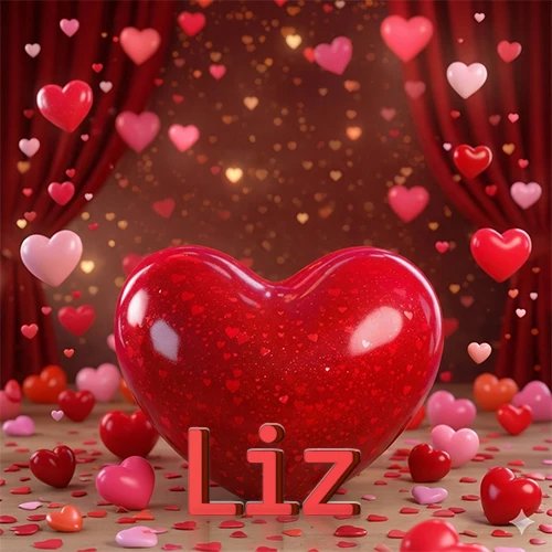 Un enorme y brillante corazón rojo en el centro del escenario bajo luces tenues y cortinas rojas, rodeado de decenas de pequeños corazones voladores que llenan de romance el lugar. El nombre Liz está escrito en el diseño.