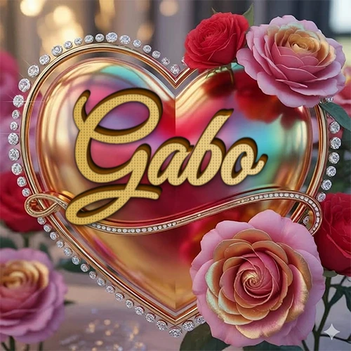 Un marco dorado con forma de corazón tachonado de diamantes, rodeado de rosas naturales en colores que van del rosa al rojo, dando un diseño lujoso y brillante. El nombre Gabo está escrito en el diseño.